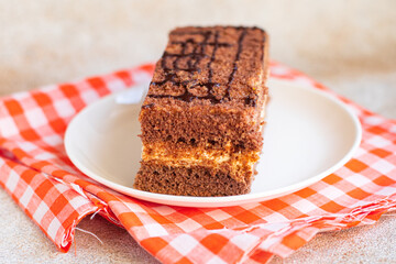 piece of chocolate cake with mousse cream sweet dessert vanilla cocoa cinnamon snack trend meal...