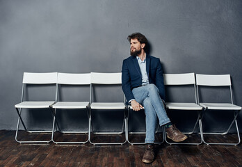 man waiting for job interview on chair lifestyle Professional