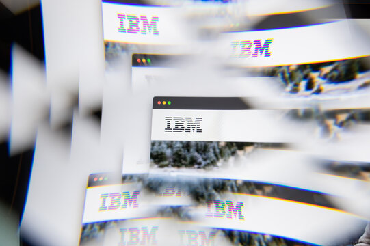 Milan, Italy - APRIL 10, 2021: IBM logo on laptop screen seen through an optical prism. Illustrative editorial image from IBM website.