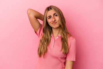 Young blonde caucasian woman isolated on pink background suffering neck pain due to sedentary lifestyle.
