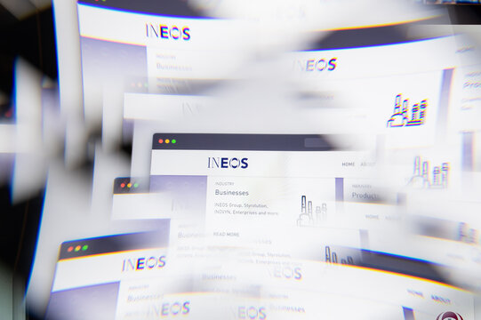 Milan, Italy - APRIL 10, 2021: INEOS logo on laptop screen seen through an optical prism. Illustrative editorial image from INEOS website.