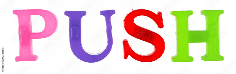 Fototapete the word push is lined with multicolored plastic letters isolated on white background.