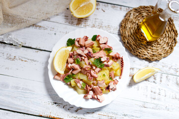 Octopus and potato salad, traditional mediterranean food