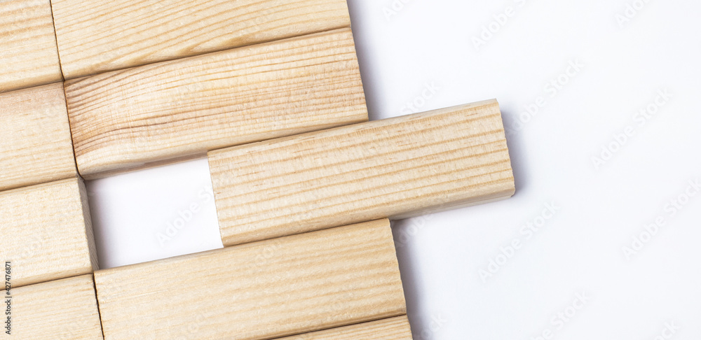 Poster on a light background, wooden blocks with a place to insert text. close-up top view. template