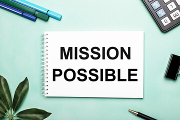 MISSION POSSIBLE is written on a white sheet on a blue background near the stationery and the Scheffler sheet. Call to action. Motivational concept