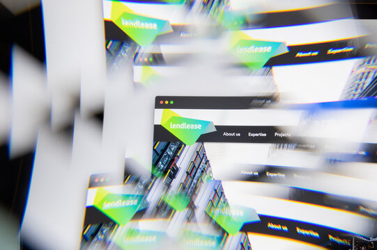 Milan, Italy - APRIL 10, 2021: Lendlease Group logo on laptop screen seen through an optical prism. Illustrative editorial image from Lendlease Group website.