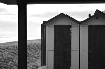 Colorful beach cabins in front of the Adriatic Sea at sunrise (Pesaro, Italy, Europe)