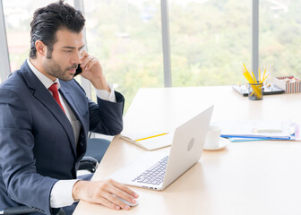 Stressed business man  is on the call to discuss about business progress and project. He has worry face