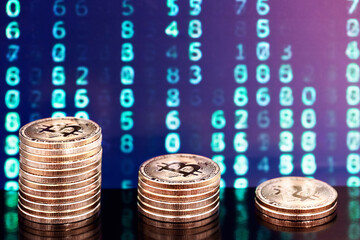 three piles of bitcoins with numbers in backgrounds