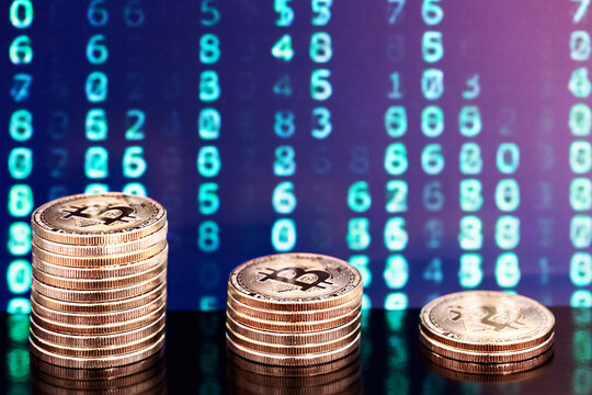 three piles of bitcoins with numbers in backgrounds - Powered by Adobe