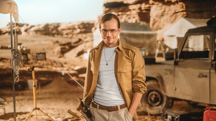 Portrait of Handsome Male Adventurer Posing and Looking at Camera. Stylish Great Archaeologist...