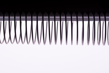 Notebook spiral spines silhouette macro shot