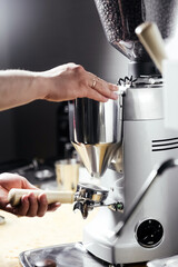 Bartender making coffee barista in a cafe