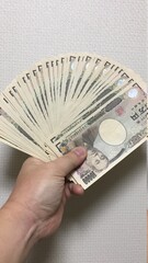 hand with money