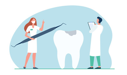 Dentists examining and treating huge tooth. Dental checkup flat vector illustration. Dental clinic, healthcare, medicine, private service concept for banner, website design or landing web page