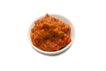 Vegetable stew in a bowl isolated on white background.