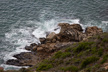 waves crashing on rocks