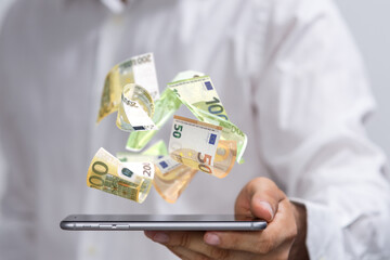 capital euro banknote in hand rain