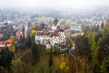 Aerial view of Dracula's Castle in the rain in Romania
