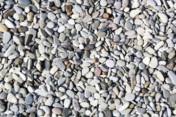 Sea stones background. Grey color.