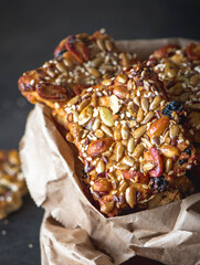 Healthy cookies with nuts, seeds, raisins and sesame seeds in a bag