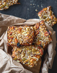 Healthy cookies with nuts, seeds, raisins and sesame seeds in a bag