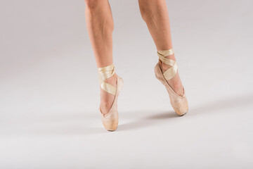 Feet close up of dancer isolated on white background.