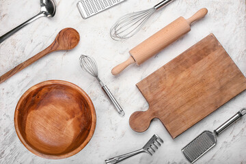 Set of kitchen utensils on light background