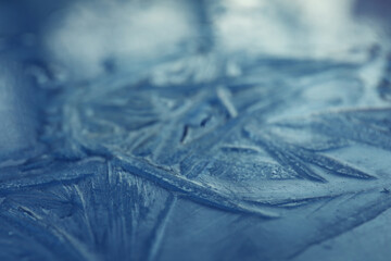 Frosty blue surface, closeup. Beautiful winter ornament