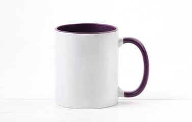 White ceramic cup colored violet inside