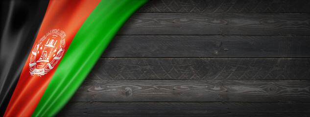 Afghan flag on black wood wall banner