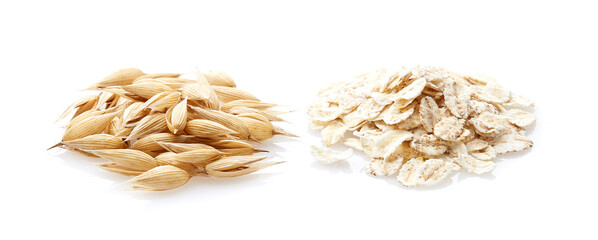 Oats flakes with oats plant isolated on white background