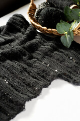women's knitted cardigan in black on the needles