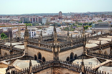 Fototapeta premium City View from Giralda Spire Bell Tower in Seville Cathedral in Andalusia Spain.