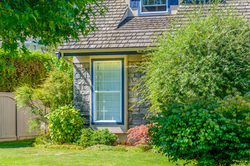 Fragment of a nice house with gorgeous outdoor landscape in Vancouver, Canada.