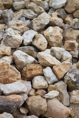 gray wall of large cobblestone.