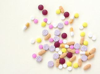 Pills and capsules background stock photo.