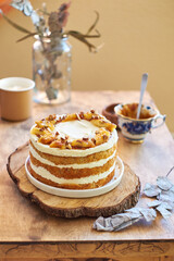 Banana cake with caramel. Wooden background, side view.