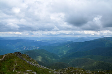 Beautiful view of mountains landscape with cloudy sky. Chornohora mountain ridge and beautiful...