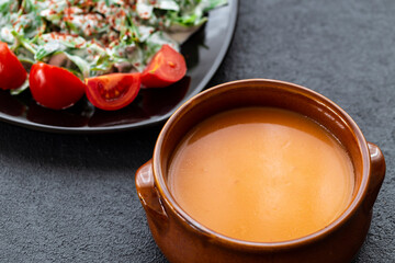 Tarhana soup. This soup is a specific kind of healthy and nutritious soup Turkey. Generally, Anatolian people consume this nice soup a lot. It is made from tomatoes, onions, red peppers and flour.