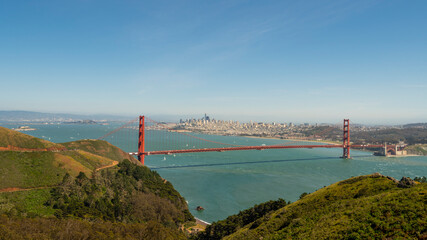 San Francisco skyline and Bay seen behind the iconic Golden Gate Bridge of Northern California