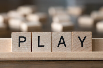 Wood Tiles Spelling Out "Play" © MeganKobe