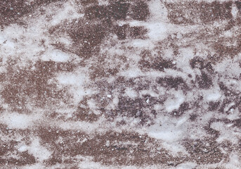 Abstract horizontal background or wallpaper. Natural ripples or blurry waves. Includes stone or foam texture, small random specks. Warm brown, gray and ivory.