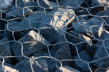 the texture of stone and metal mesh