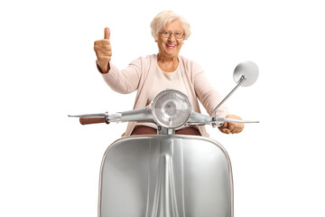 Grandma riding a vintage silver scooter and showing thumbs up