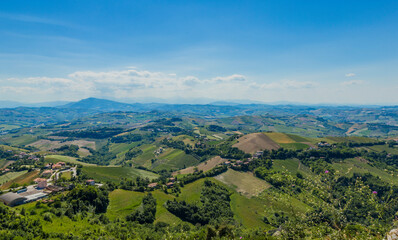 Beautiful landscape with countryside, mountain and cloudy sky