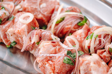 marinated meat for barbecue. Meat skewered and ready to grill