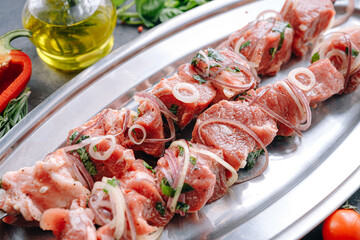 marinated meat for barbecue. Meat skewered and ready to grill