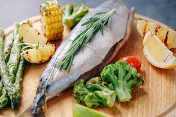 mackerel seasoned with spices and lemon juice ready for grilling