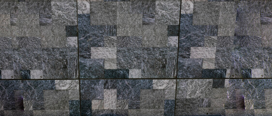 Facade gray tiles.Abstract pattern.Repair of walls and facades